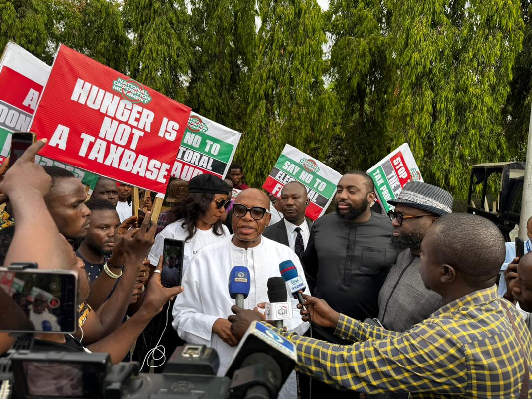 Electoral act amendment: Amaechi joins protest with son